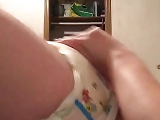 Little plays upon soggy diaper