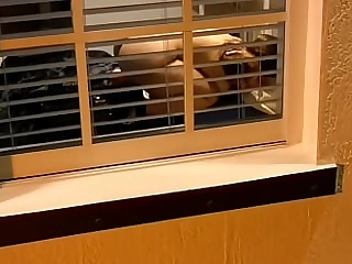Spying with a fly down on my neighbor witnessing porno with a fuck machine