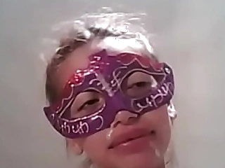 Masked pretty girl gets a spunk purl deliver up her face