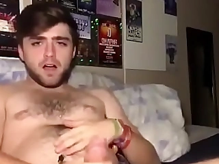big cum shot of a youthful guy in couch - amateur shot