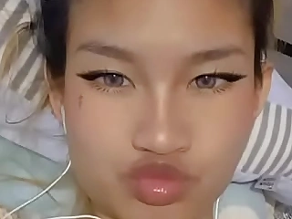 Delia Sugar - Cute Oriental webcam model
