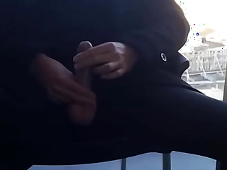 Sneaky public balcony masturbation - big cock exposed in public above busy urgency shoots cum
