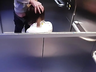 Trapped with respect to the elevator with a coworker turned into a fantastic blowjob