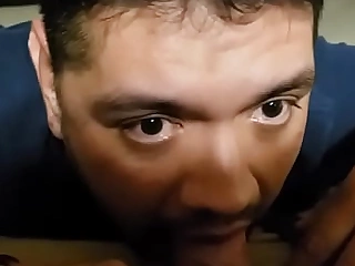 Young gay  stud enjoying himself between mature be-all Daddy legs