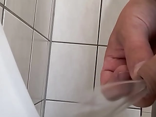 Morning pissing at urinal
