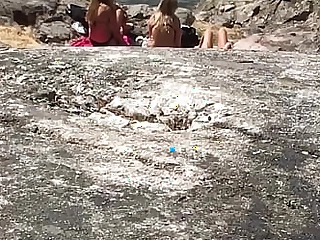 Jerking off behind 3 swedish teens at one's disposal rub-down the shore