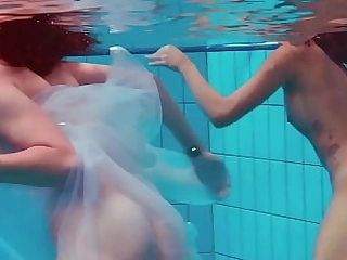 Watch sexiest girls swim naked in be imparted to murder pool