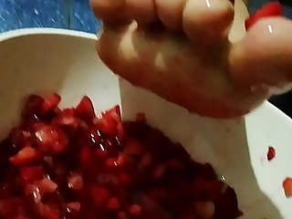 Crushing strawberries with my feet