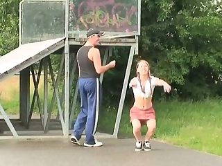 The jogging trainer takes his young student into the woods