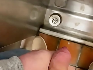 Playing fro personally in a public toilet big cumshot
