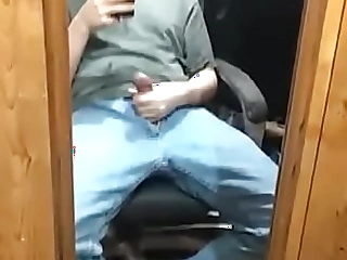 Fully clothed masturbating into a mirror