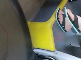 scorching asian college student feet in flip flops in excess of bus