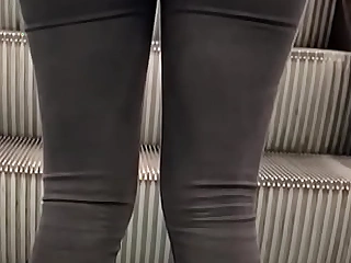 Ginger nut on escalator (Jeans candid)