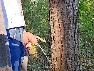 Urinating endowed - uncut cock in woods