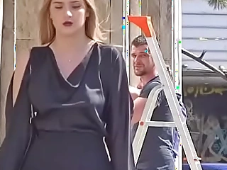 Braless girl bouncing her saggy tits in public