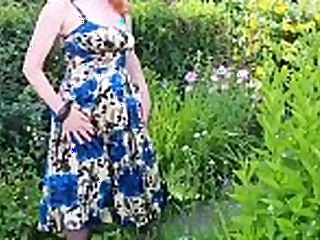 Busty honey Red Gonzo fingers herself back the garden